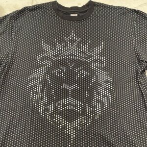 Large Unworn Men's Nike Tshirt. Black with a Silver Lion.